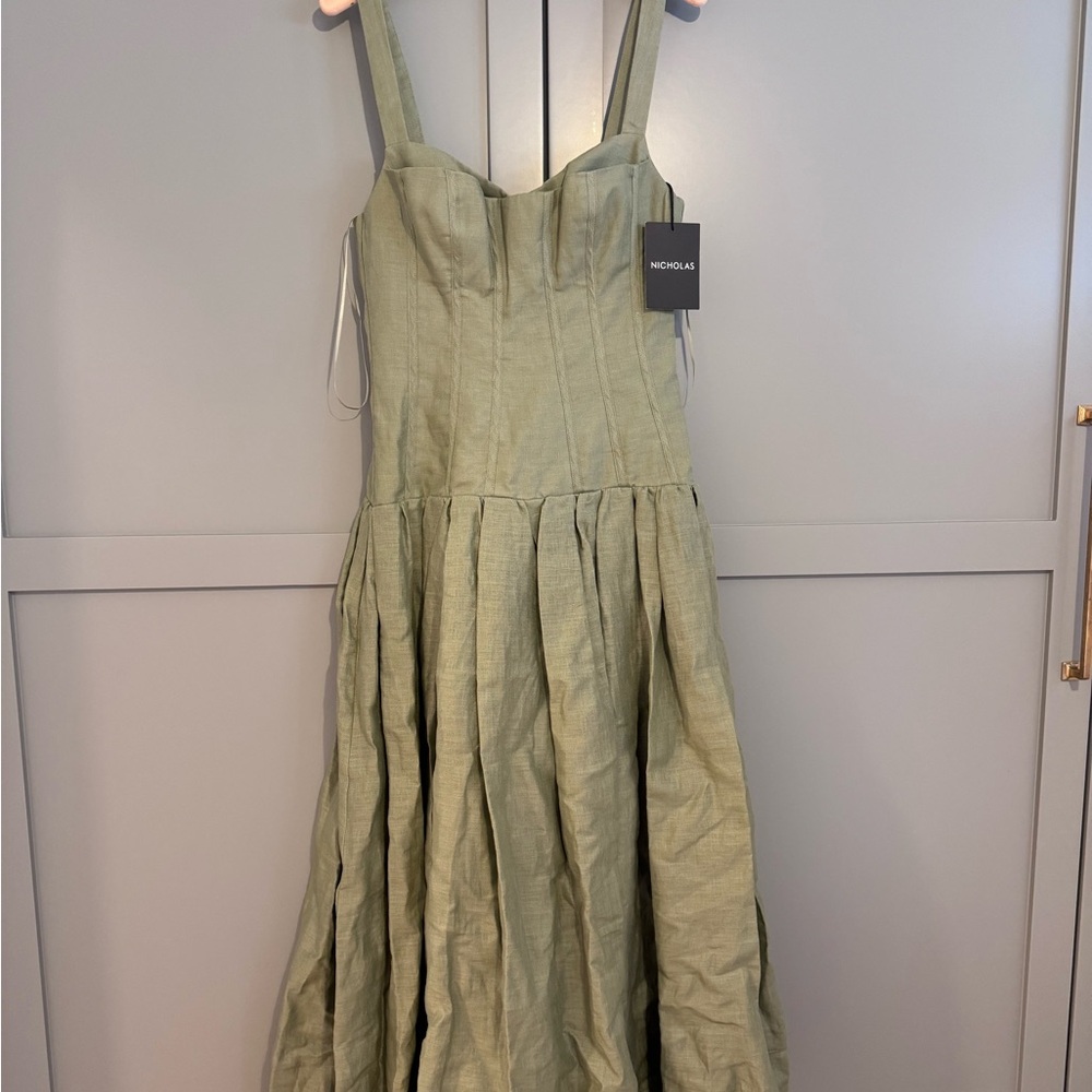 NICHOLAS Makenna midi-dress is crafted of linen drop-waist corset bodice